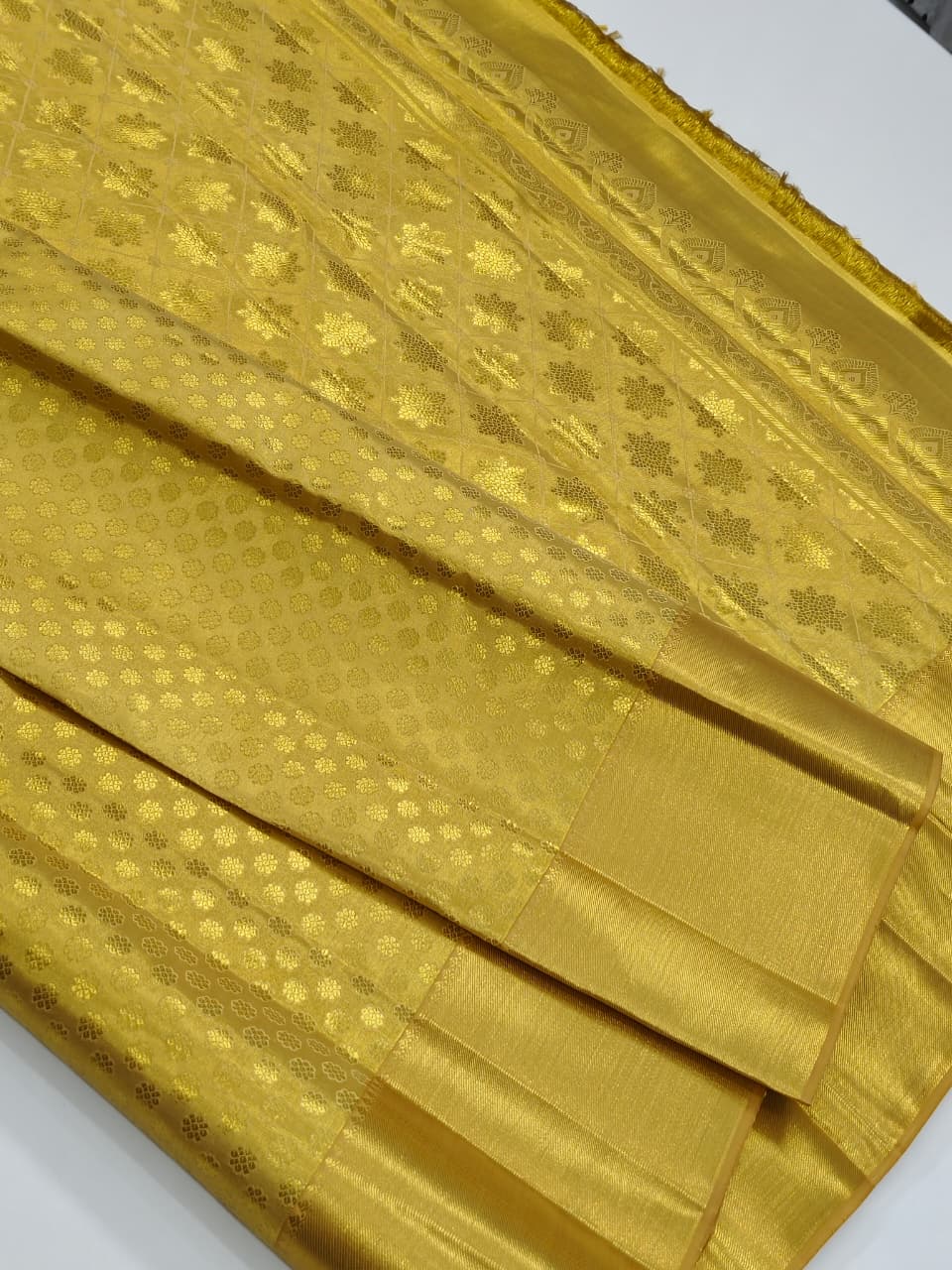 Muttu Kattam Gold Pure Kanchipuram Silk Saree.